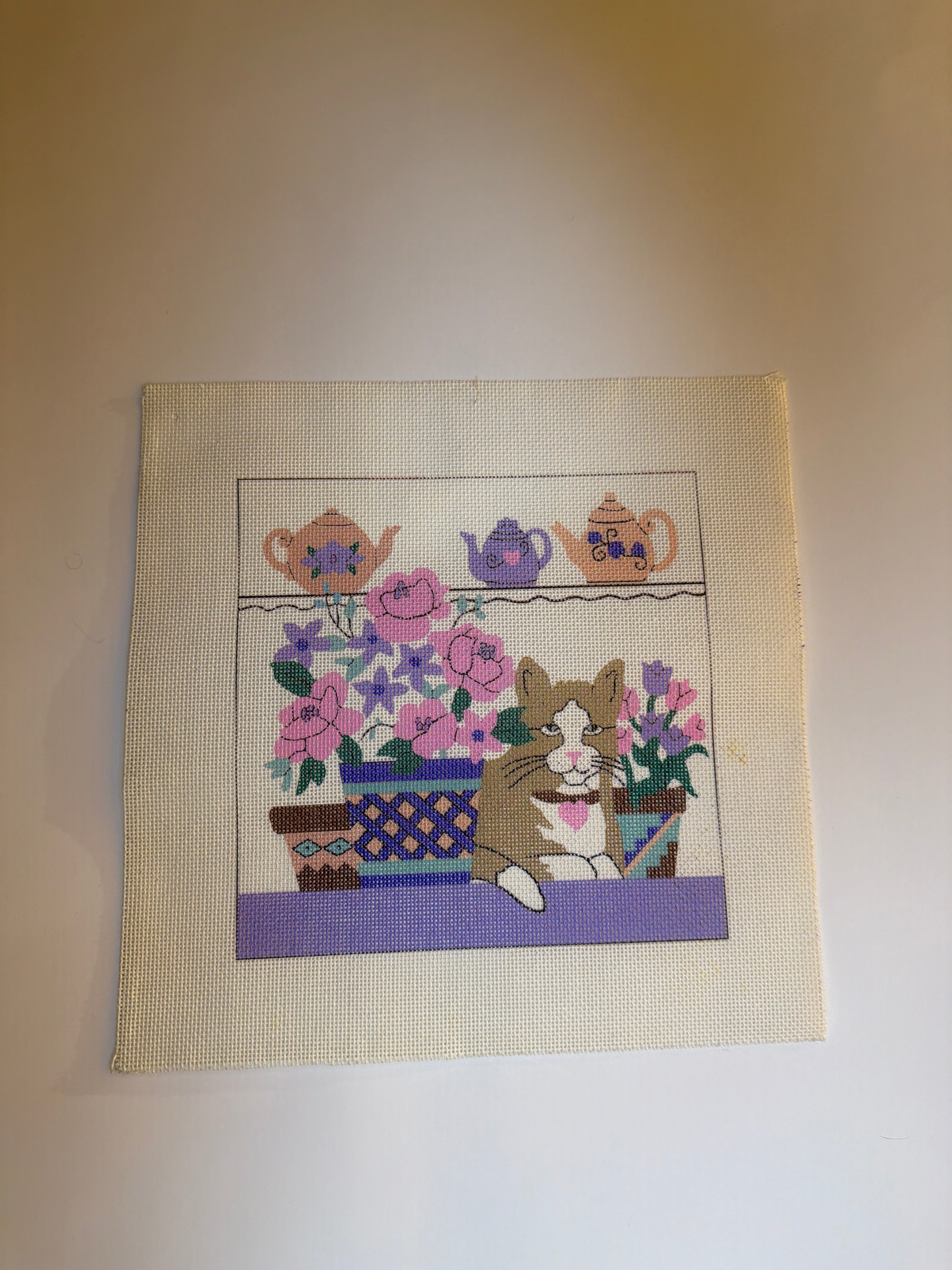 Cat with Potted Plants and Teapots