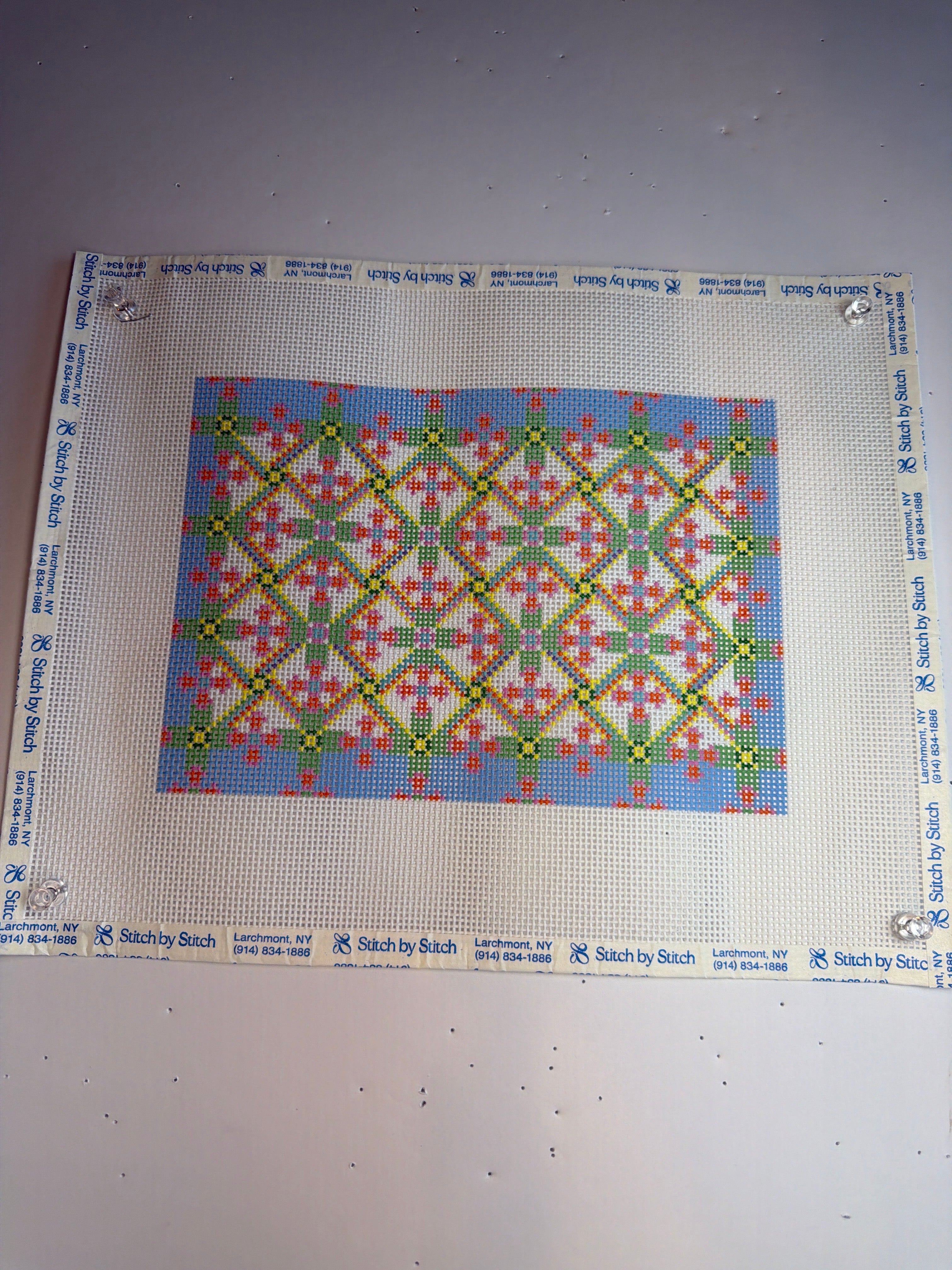 Geometric Clutch (with blue and orange background)