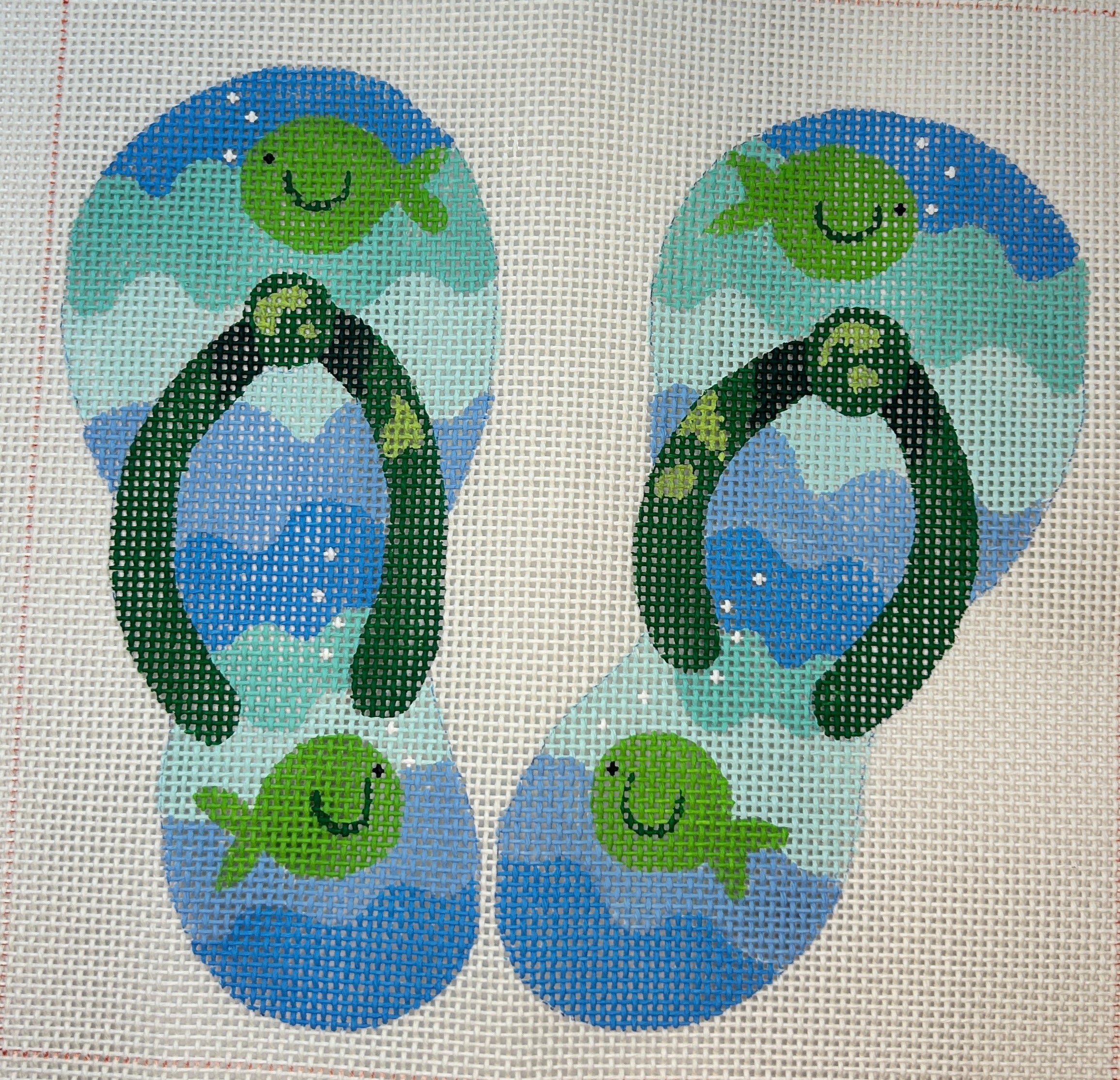 Pair of Flipflops with Green Fish