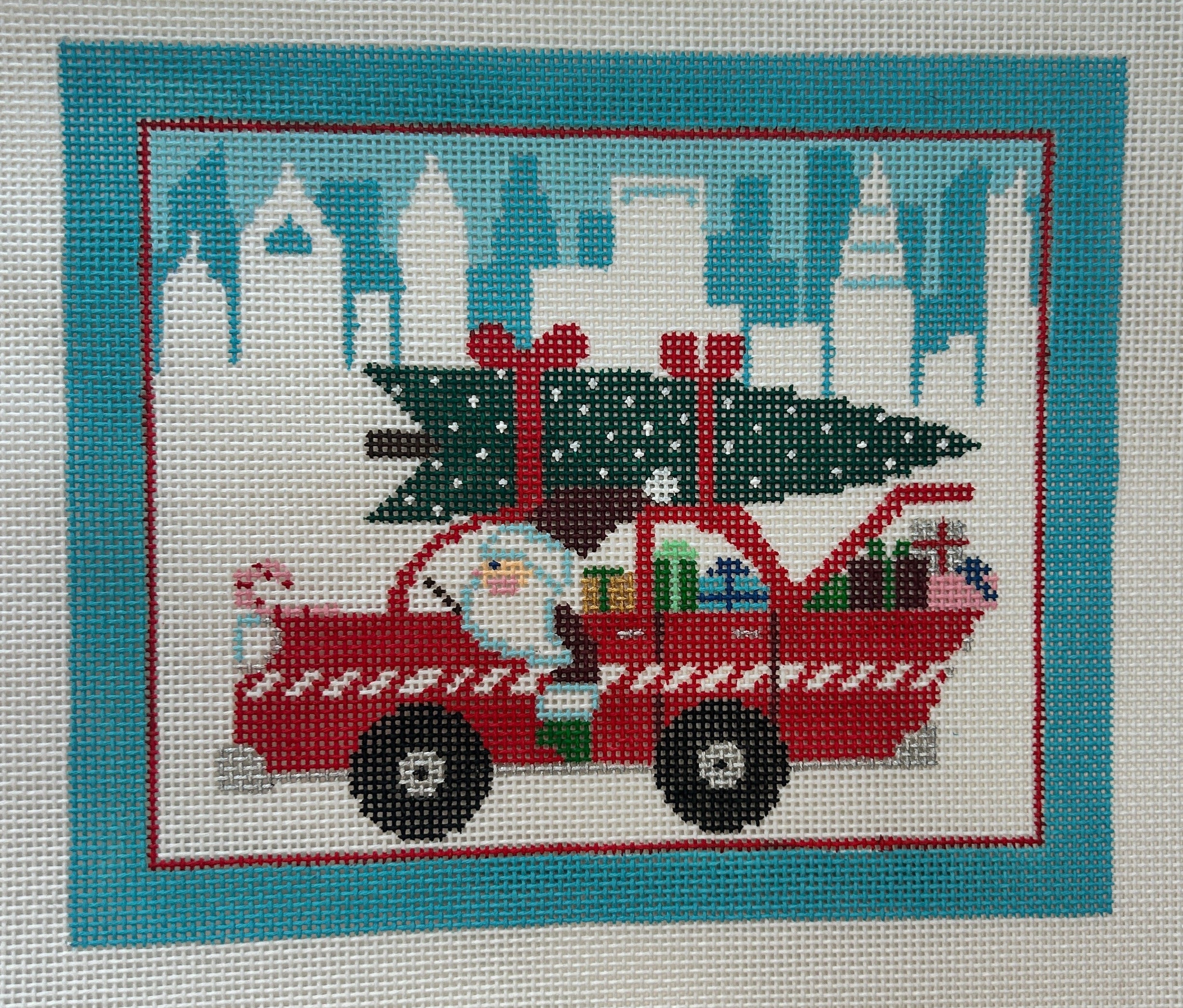 Santa in Red Car (with cityscape)
