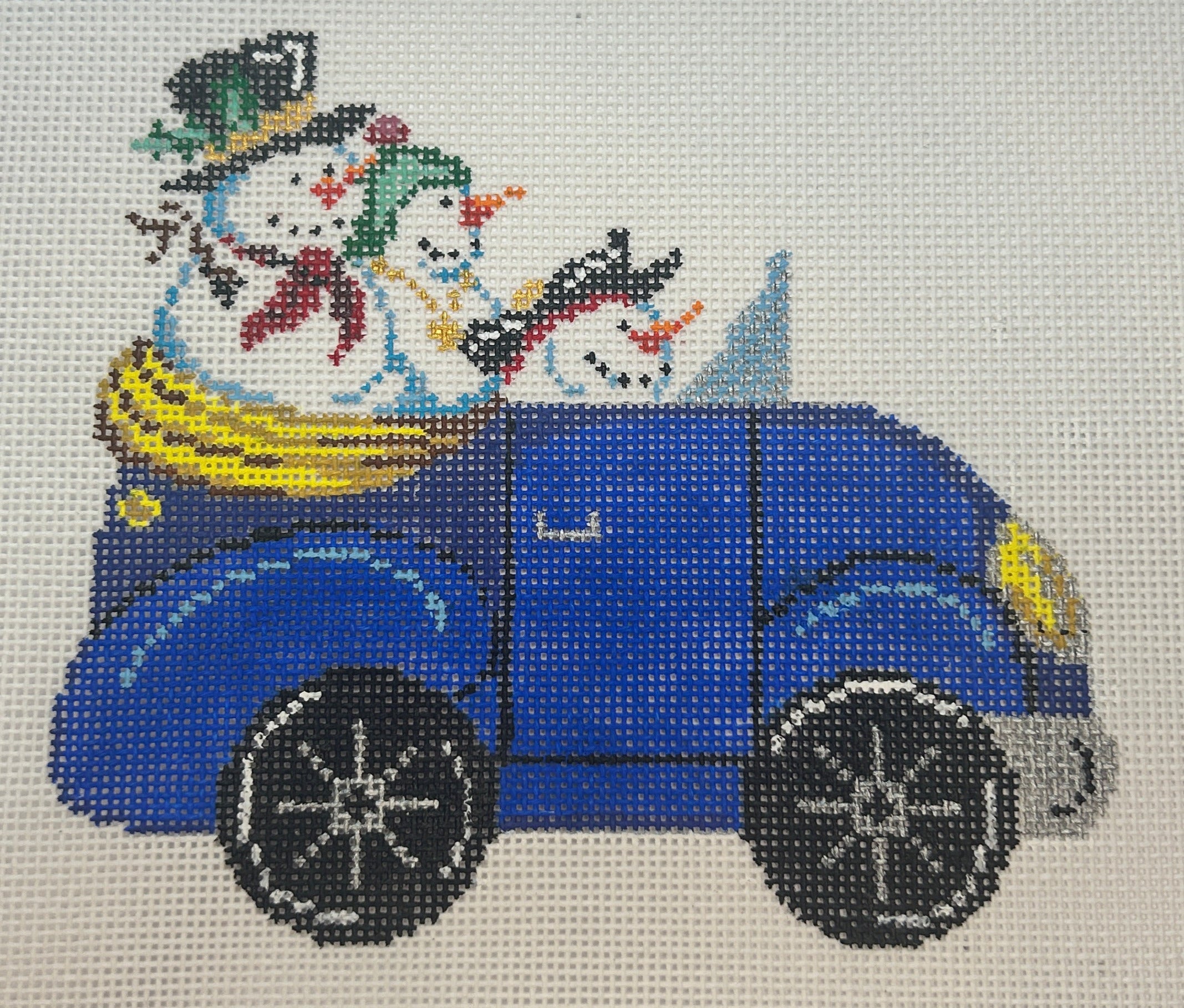 Snowmen in Blue Car