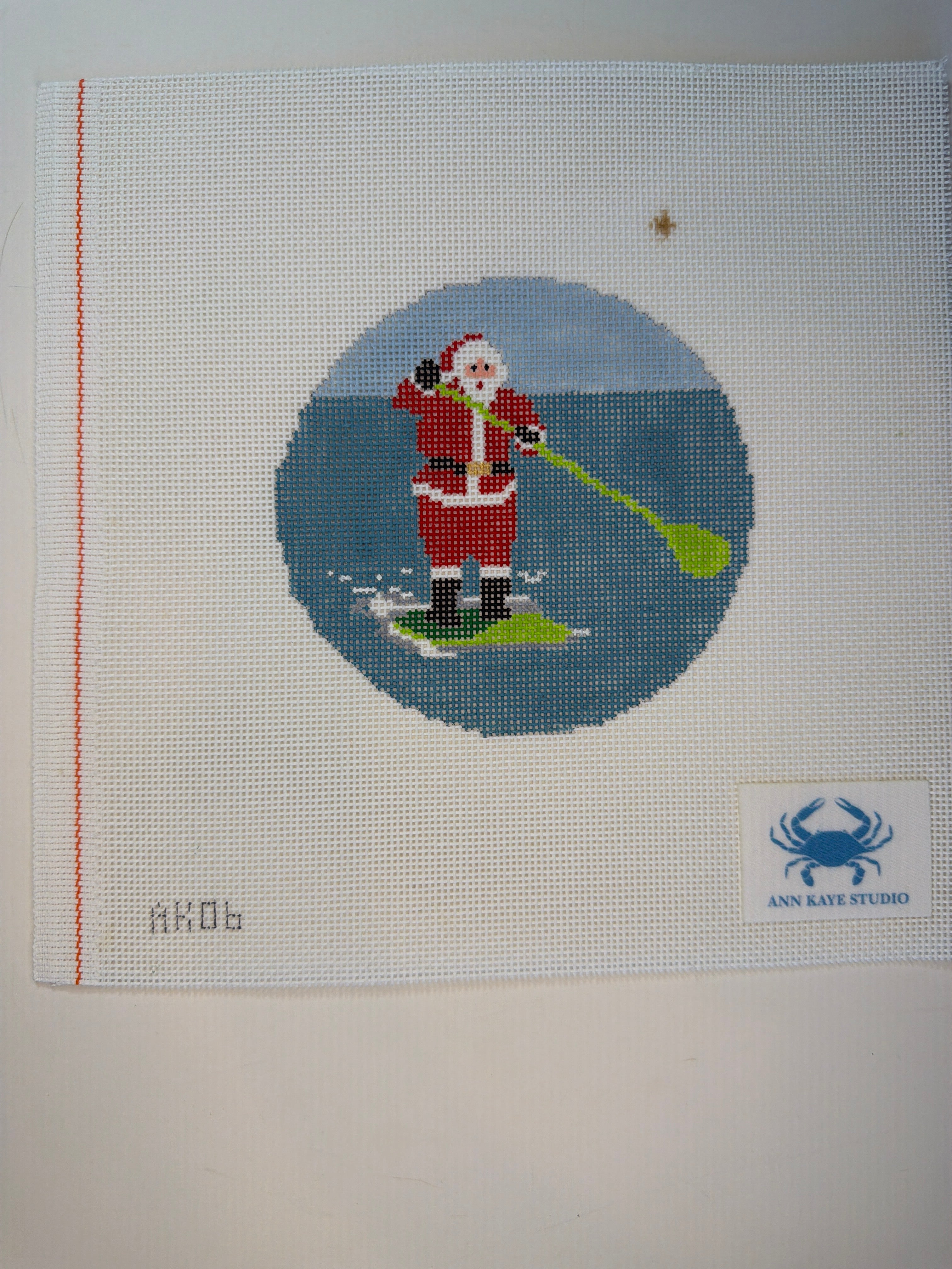 Paddleboarding Santa