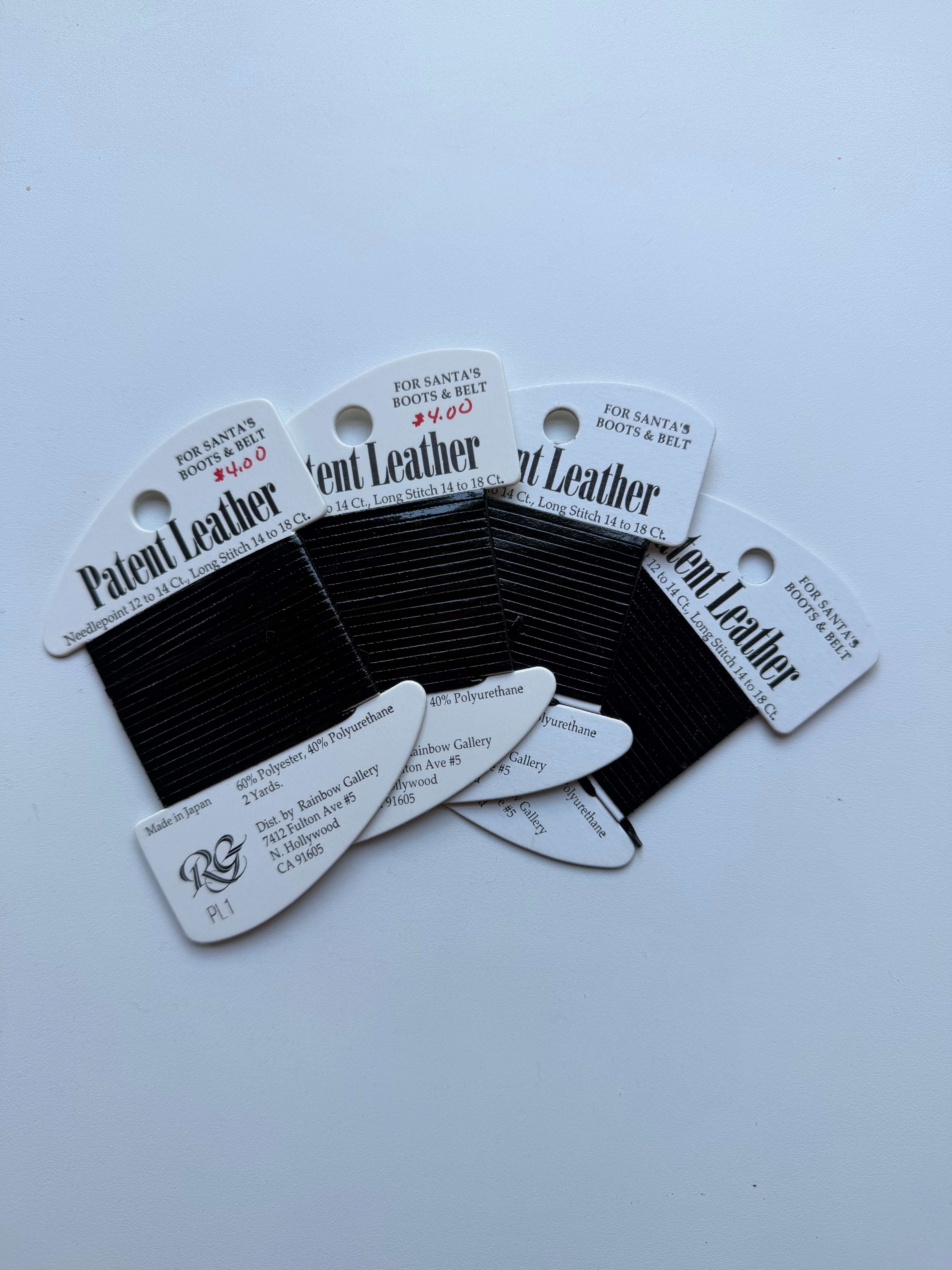 4 cards of Black Patent Leather Rainbow Gallery Thread